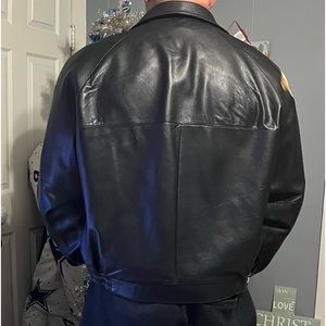 Men’s Black Wilson Leather waist length black jacket. It’s a XL and mint